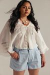 CRVY Moon Sign Pleated Shorts