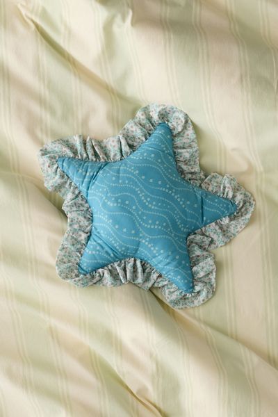Coussin décoratif à volants en forme d'étoile imprimée