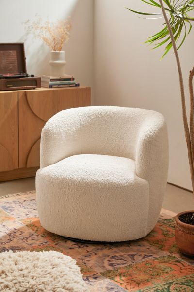 Urban Outfitters Dover Faux Sheepskin Upholstered Swivel Chair In Ivory At