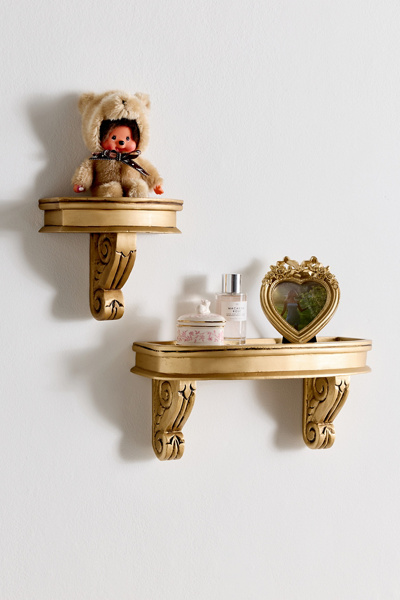 URBAN OUTFITTERS CORINNE CARVED MANGO WOOD WALL SHELF IN GOLD AT URBAN OUTFITTERS