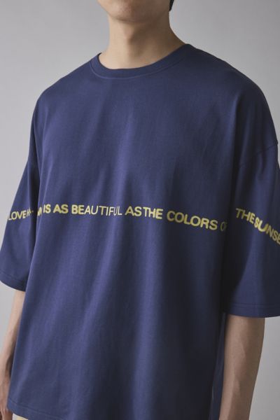 TEE LIBRARY HER SMILE GRAPHIC TEE IN NAVY, MEN'S AT URBAN OUTFITTERS 