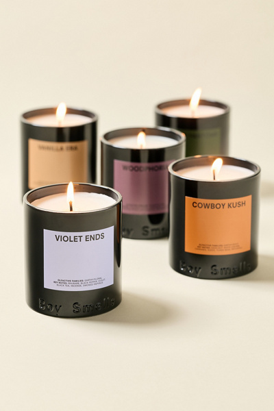 Boy Smells Candle