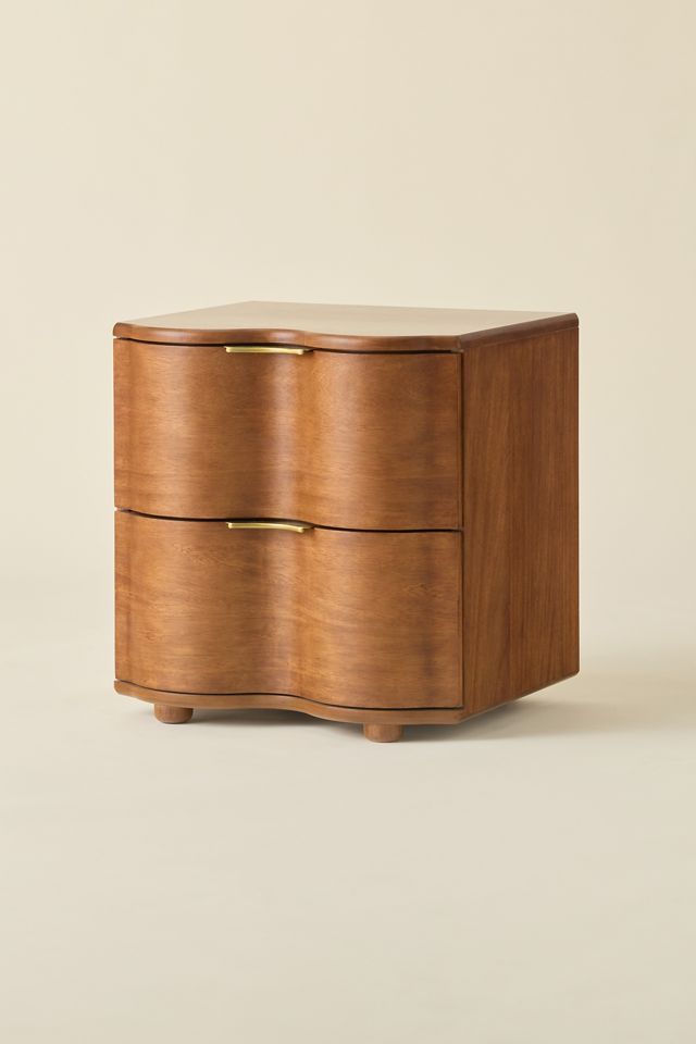 Copper-toned drawer nightstand from side/front angle