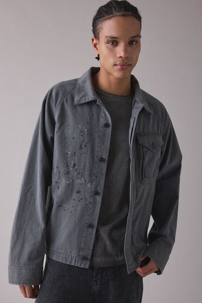 Veste Snow Peak teinte au soufre avec éclaboussures de peinture