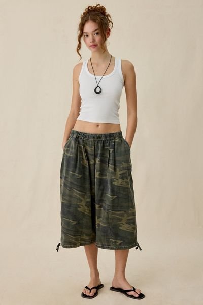 Vintage 90s Levi's® 560 Light Wash Distressed Cut Off Shorts