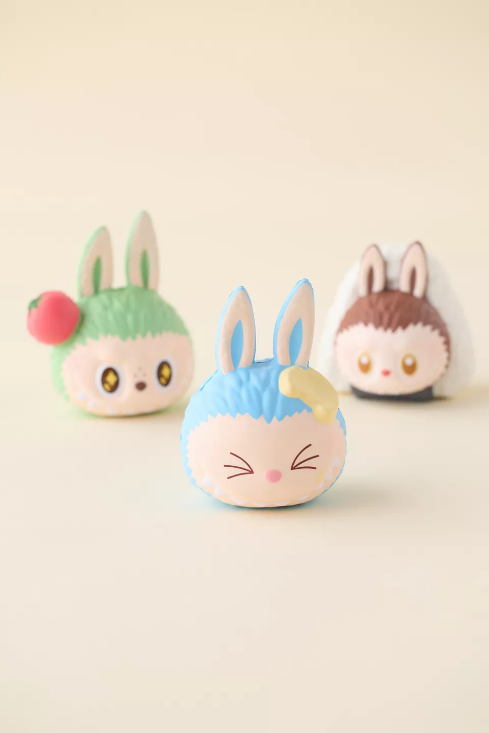 Three squishy Labubu heads