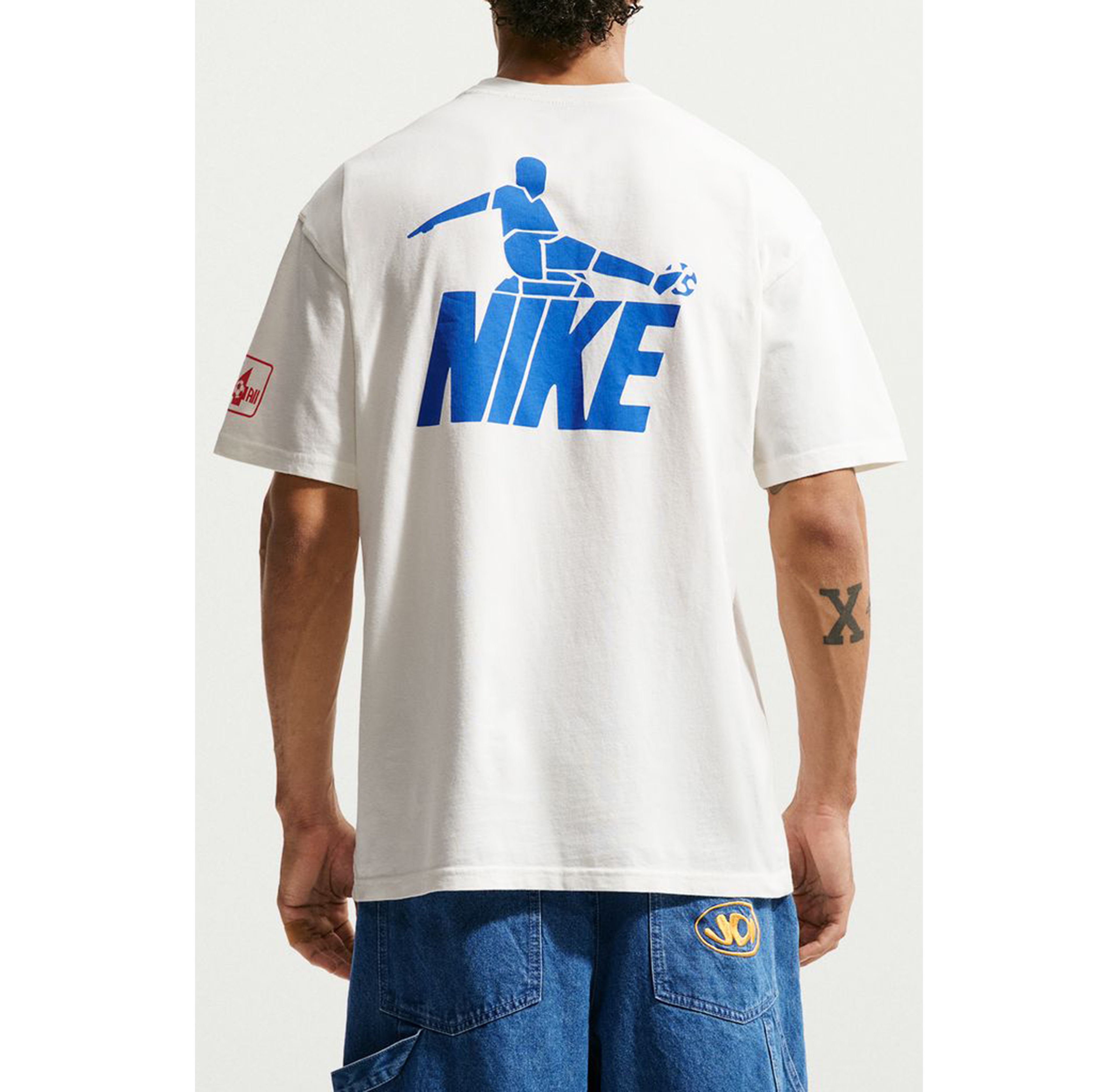 Nike Sportswear Friendship Tournament Soccer Graphic Tee
