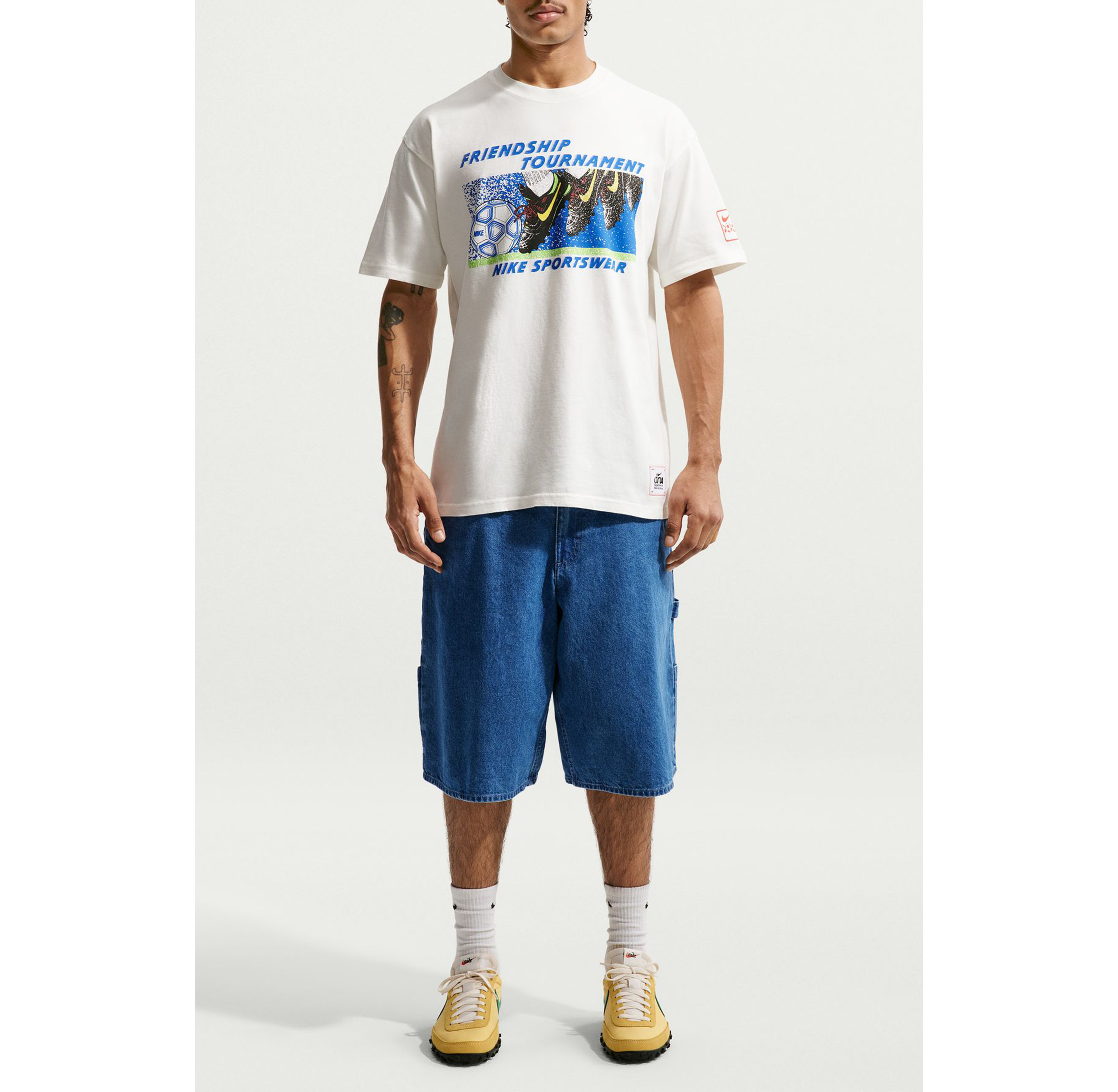 Nike Sportswear Friendship Tournament Soccer Graphic Tee