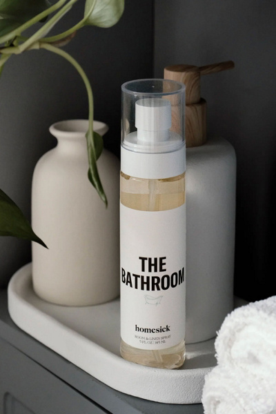 Homesick Linen & Room Spray In The Bathroom At Urban Outfitters In White