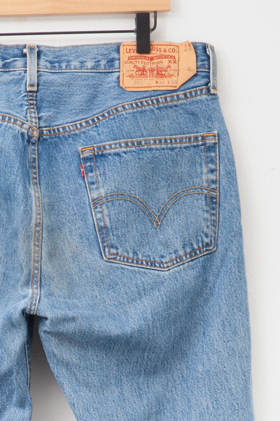 Vintage 1990s Distressed Levi’s® 501 Light Wash Denim Jeans