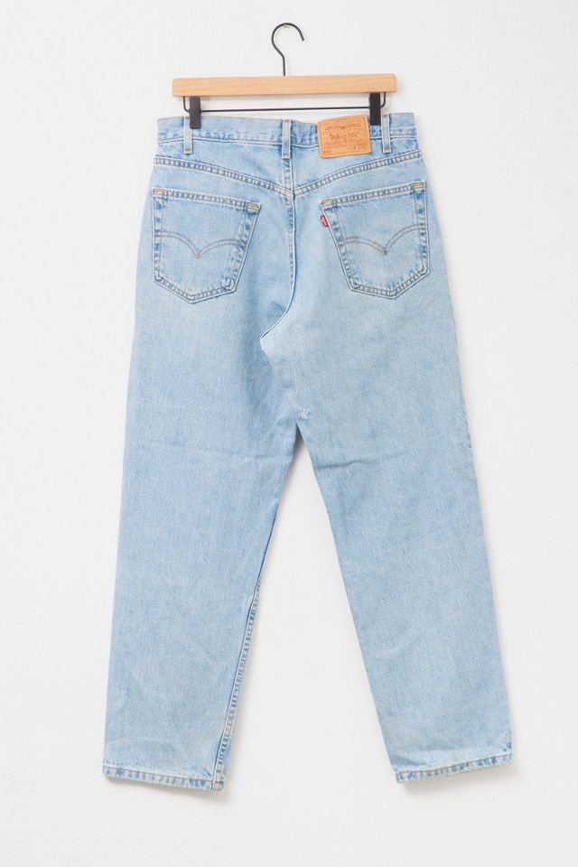 Vintage 1990s Levi’s® 550 Distressed Light Wash Denim Jeans #1