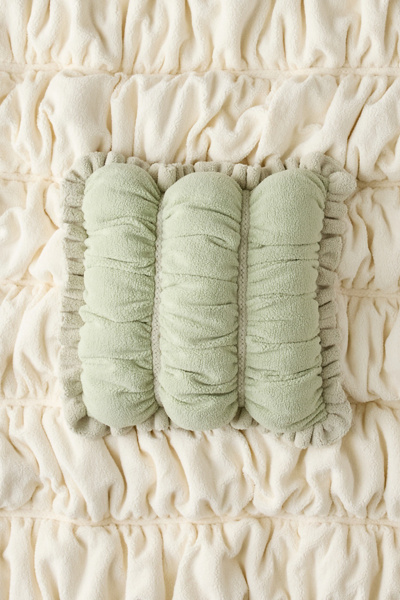 Cinched Marshmallow Puff Fleece Throw Pillow in Sage at Urban Outfitters