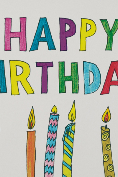 Red Cap Colorful Candles Birthday Greeting Card