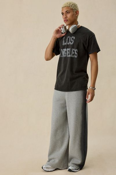 Pantalon de jogging ample à ourlet ouvert à rayures vaporisées UO