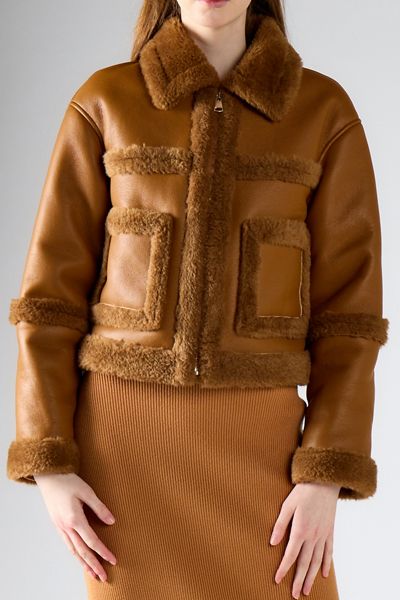 Veste courte en simili cuir avec garniture en fausse fourrure Glamorous