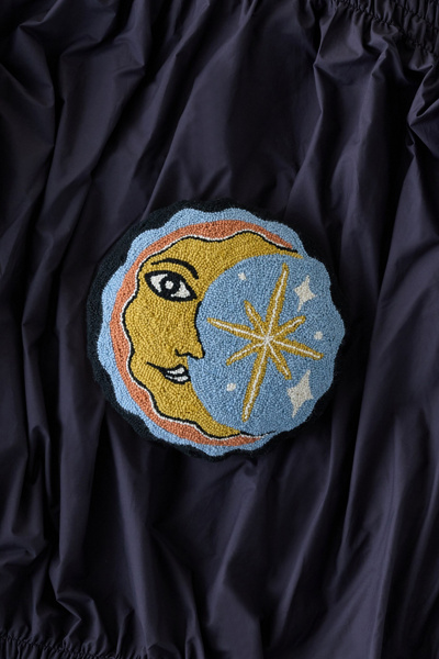 Celestial Moon Slice Round Tufted Wool Throw Pillow in Blue at Urban Outfitters
