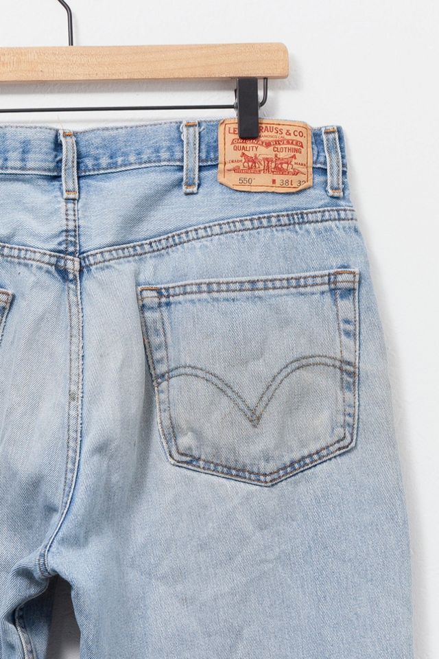 Vintage Y2K Levi’s® 550 Distressed Light Wash Denim Jeans #3