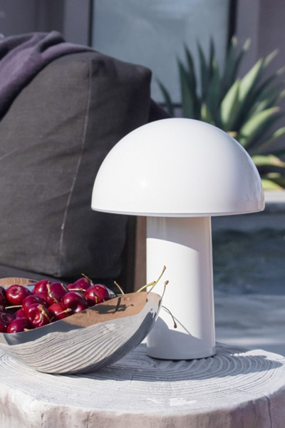 Brightech Celia LED Portable Rechargeable Table Lamp in Glossy Ivory Cream at Urban Outfitters