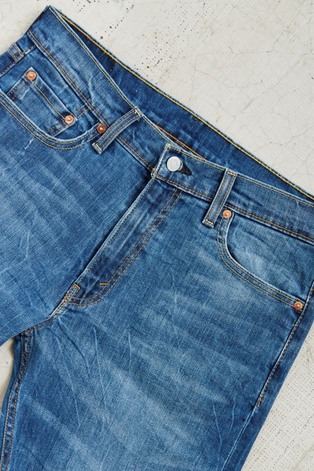 Levi's 513 Damaged Stone Wash Jean | Urban Outfitters