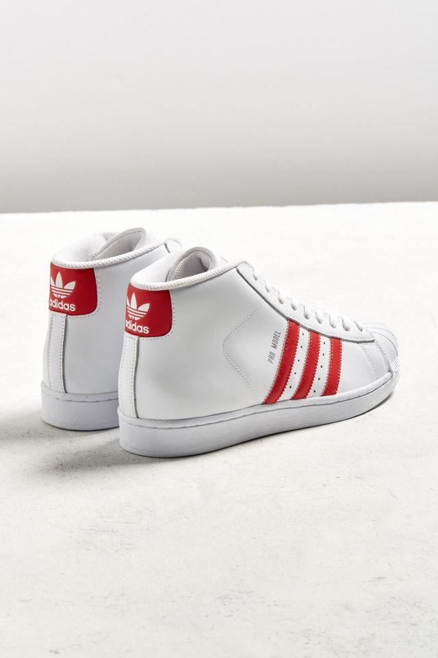 Adidas pro model hot sale white with red stripes