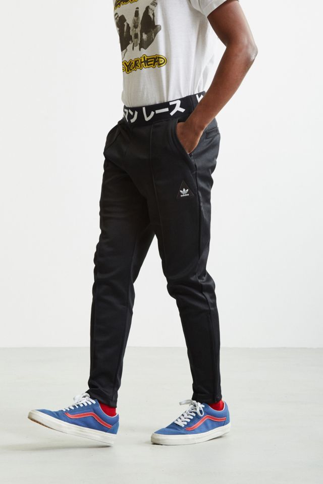 Adidas pharrell williams track pants on sale