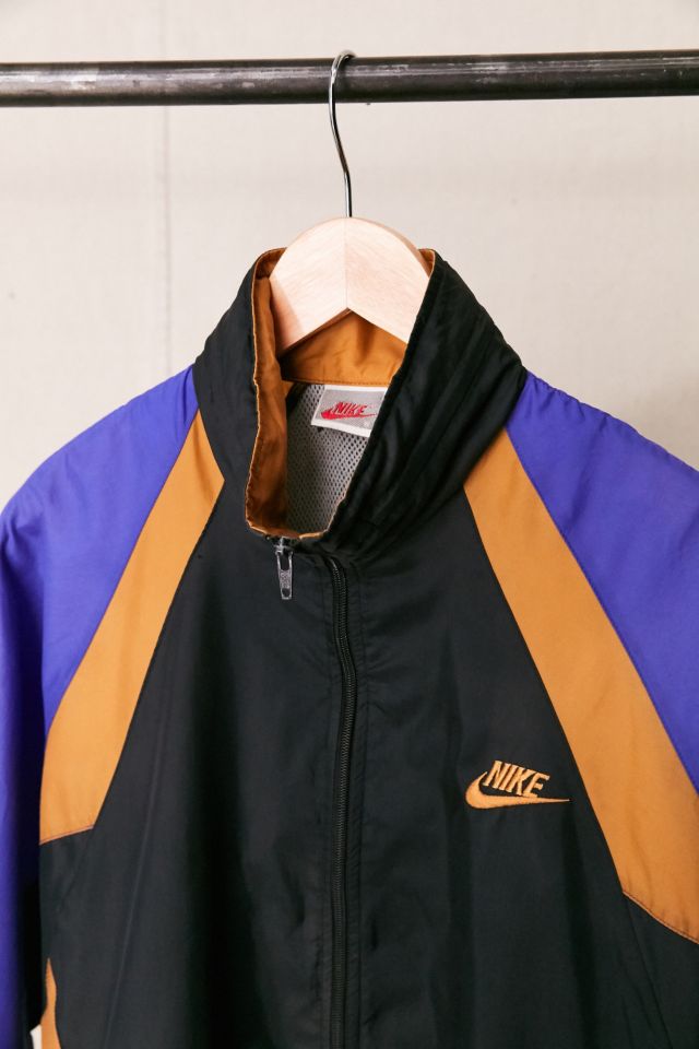 Nike black and gold sales windbreaker