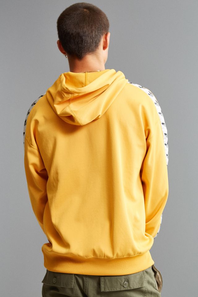 Adidas originals adicolor tnt shop tape hoodie in yellow