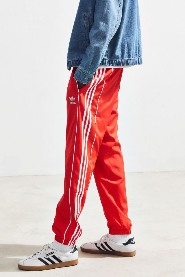 Red adidas store wind pants