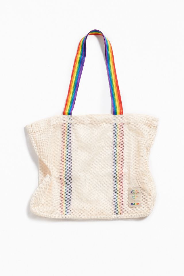 A Person Holding a Rainbow Tote Bag · Free Stock Photo