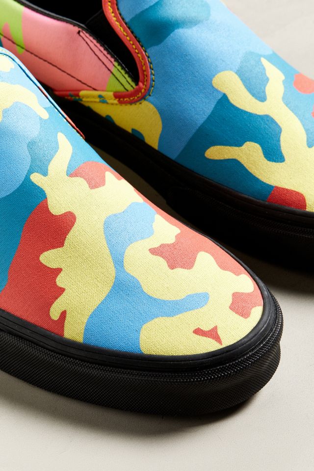 Vans neon camo hot sale slip on