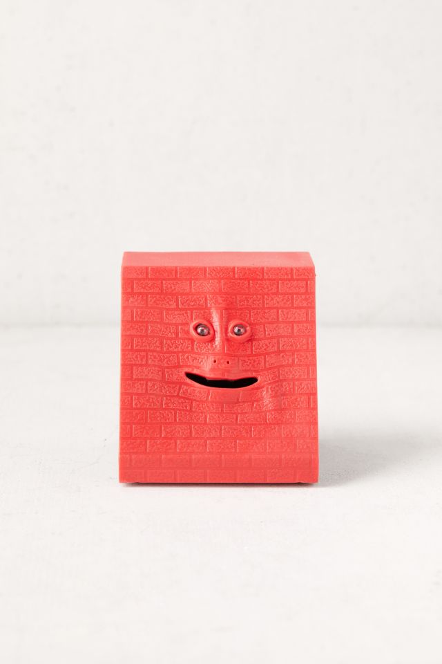 Banque en forme de visage qui mange la monnaie #2