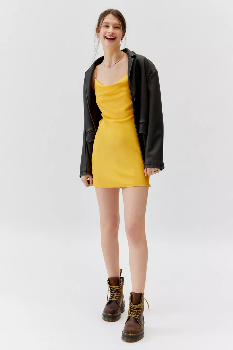 Brown combat boots styled with slip dress