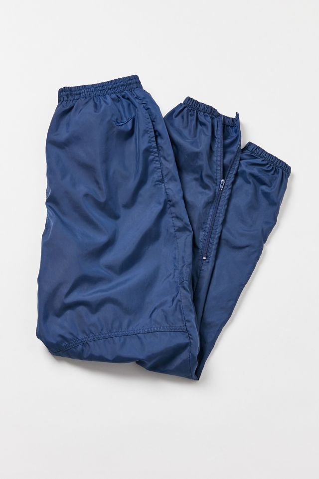 Blue nike track on sale pants