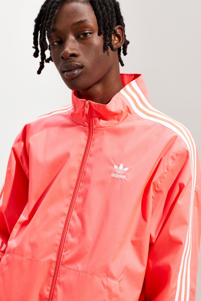 Adidas originals locked up discount logo track jacket in red