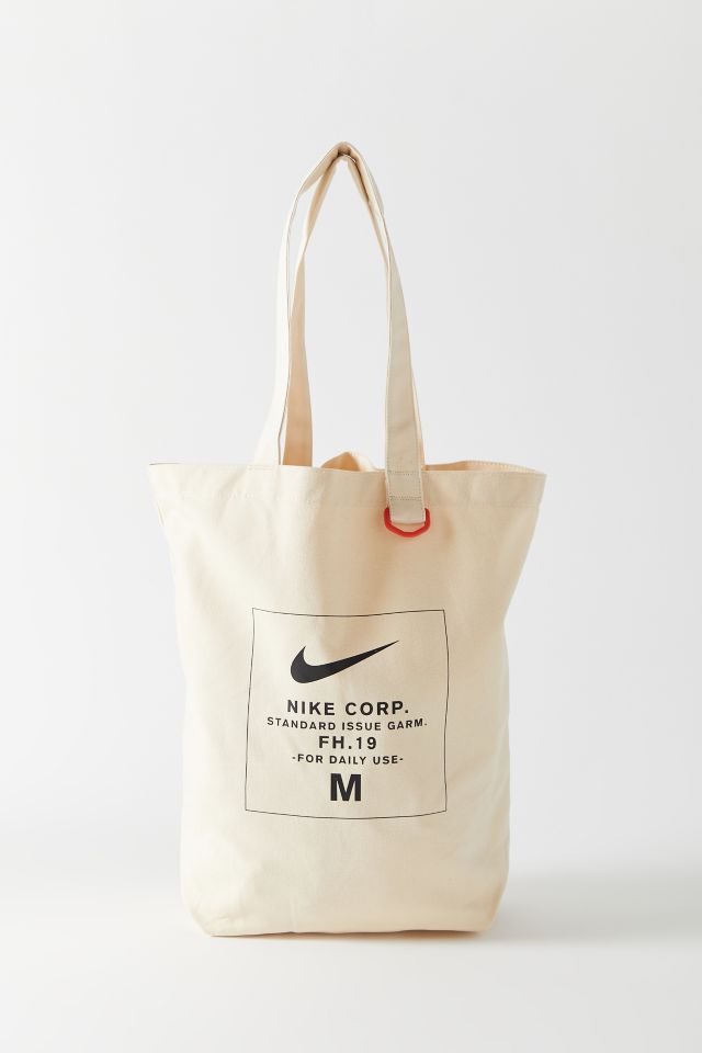 Nike, Bags, Nike Nwot Heritage Canvas Tote Bag Cream Covered With Vintage  Past Nike Labels