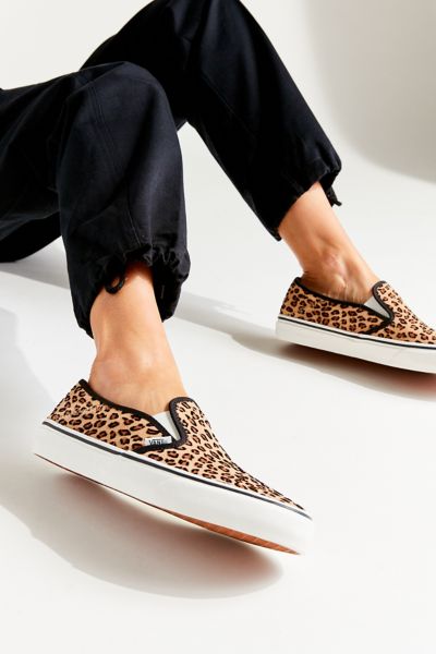 Vans cheetah shop print slip ons