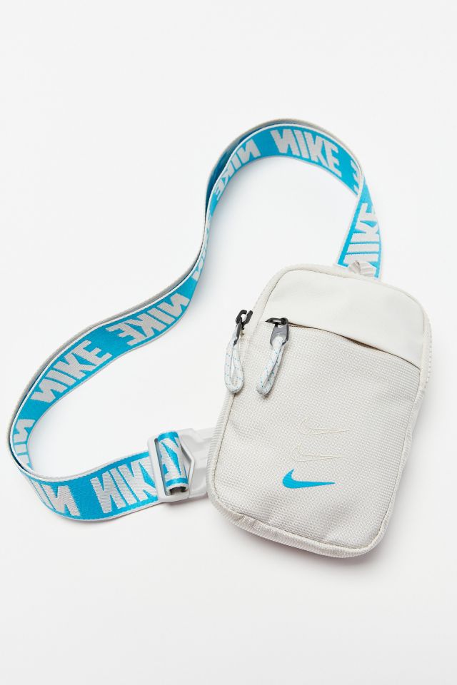 Shoepify by: Aerokicks - Nike Sportswear Essential Crossbody Bag Details  Product Sku: 53677266; Color Code: Advance your athletic style with this  compact Nike pack featuring a branded buckle strap that rests comfortably