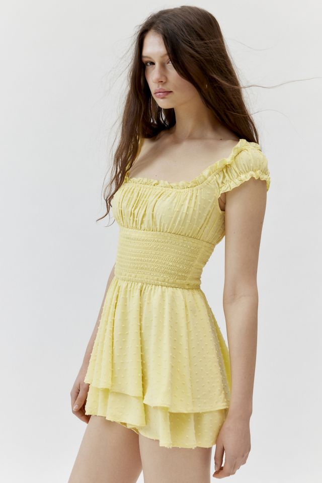 UO Rosie Smocked Tiered Capped Sleeve Ruffle Romper | Urban Outfitters