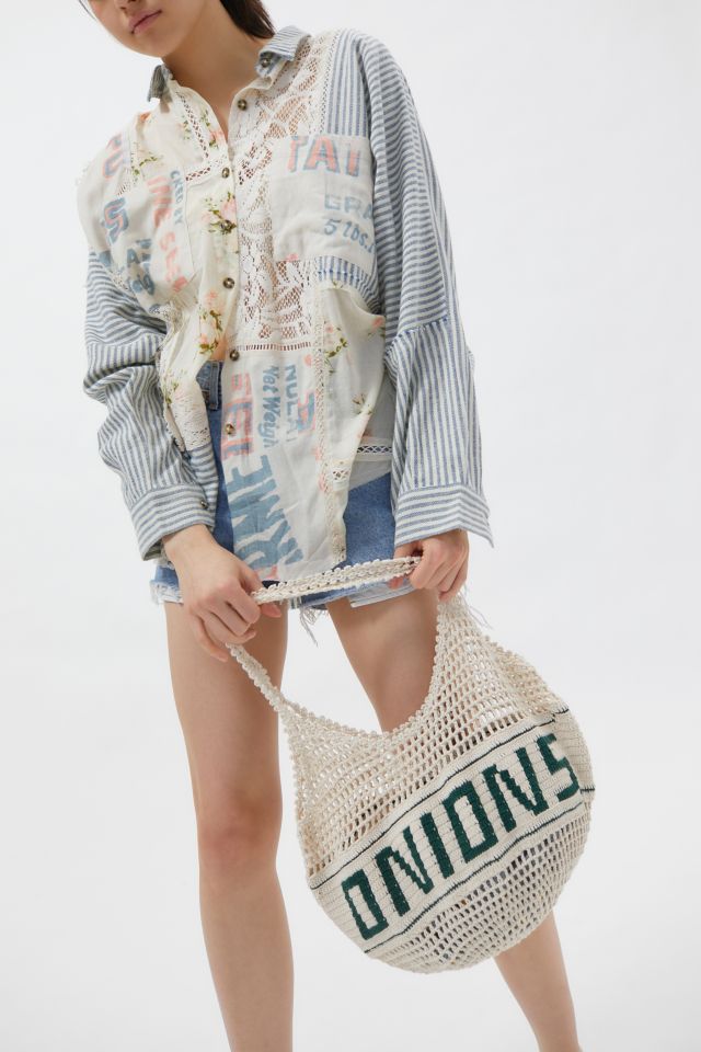 Kimchi & Blue Kimchi Blue Suede Zip Lip Tote Bag, $98, Urban Outfitters