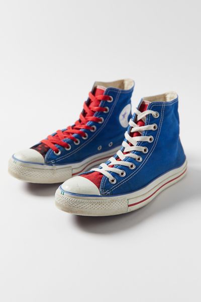 White converse with outlet red and blue stripe