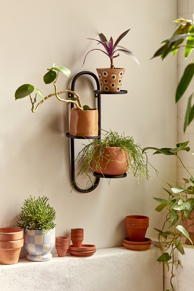 URBAN OUTFITTERS WALL MOUNTED PLANT STAND IN BLACK AT URBAN OUTFITTERS