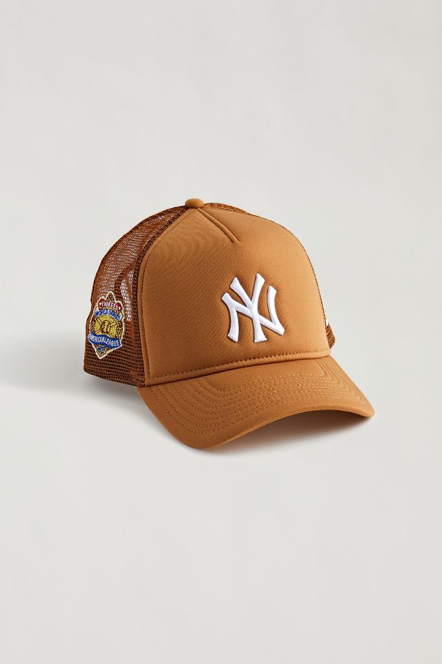 Shop New Era MLB NY Yankees Mesh Trucker Cap in Orange