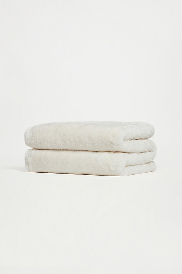 APPARIS APPARIS BRADY FAUX FUR BLANKET IN IVORY AT URBAN OUTFITTERS