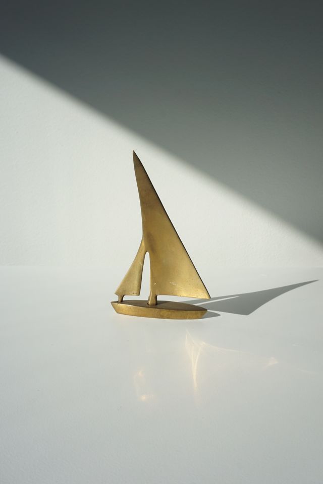 vintage brass sailboat