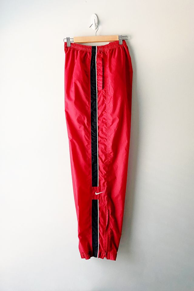 Red nike hot sale windbreaker pants