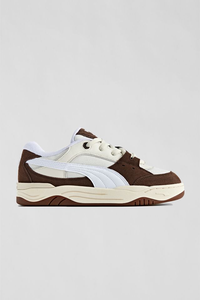 PUMA 180 sneakers in chalk and brown with rubber sole