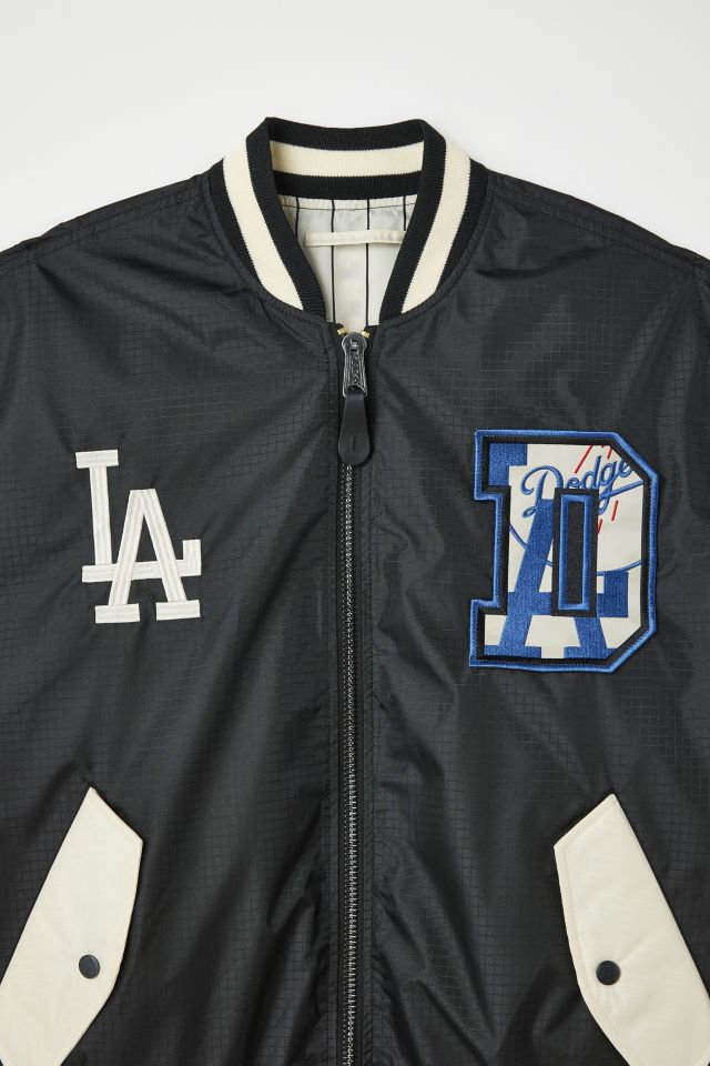 NEW ERA X ALPHA INDUSTRIES LOS ANGELES DODGERS REVERSIBLE BOMBER JACKE –  SHIPPING DEPT