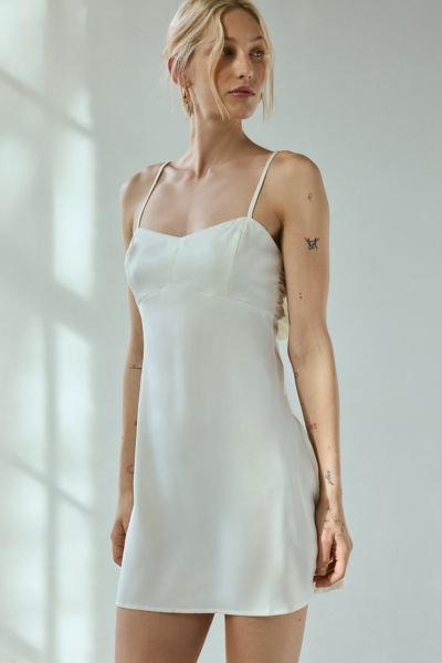 Urban Outfitters Uo Bella Bow-back Satin Mini Dress In White