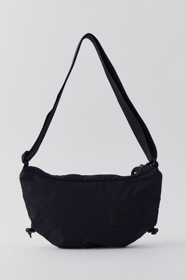 The north 2025 face convertible crossbody