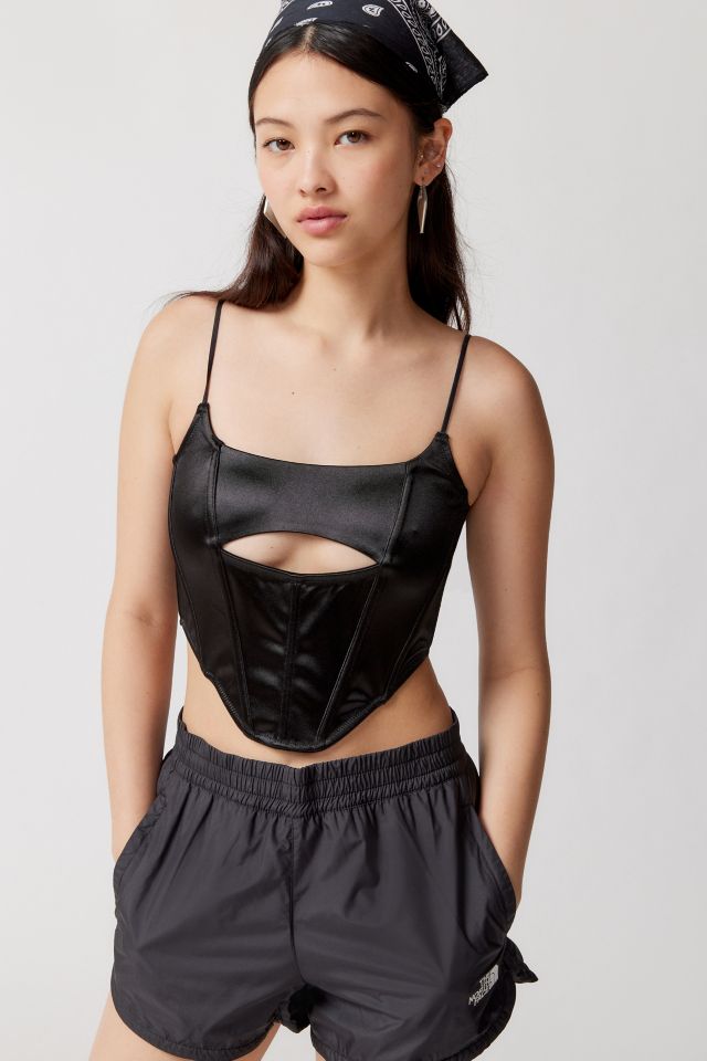 I bought Urban Outfitter's viral corset thinking I would look cute and  dainty, my 'quarterback shoulders' let me down